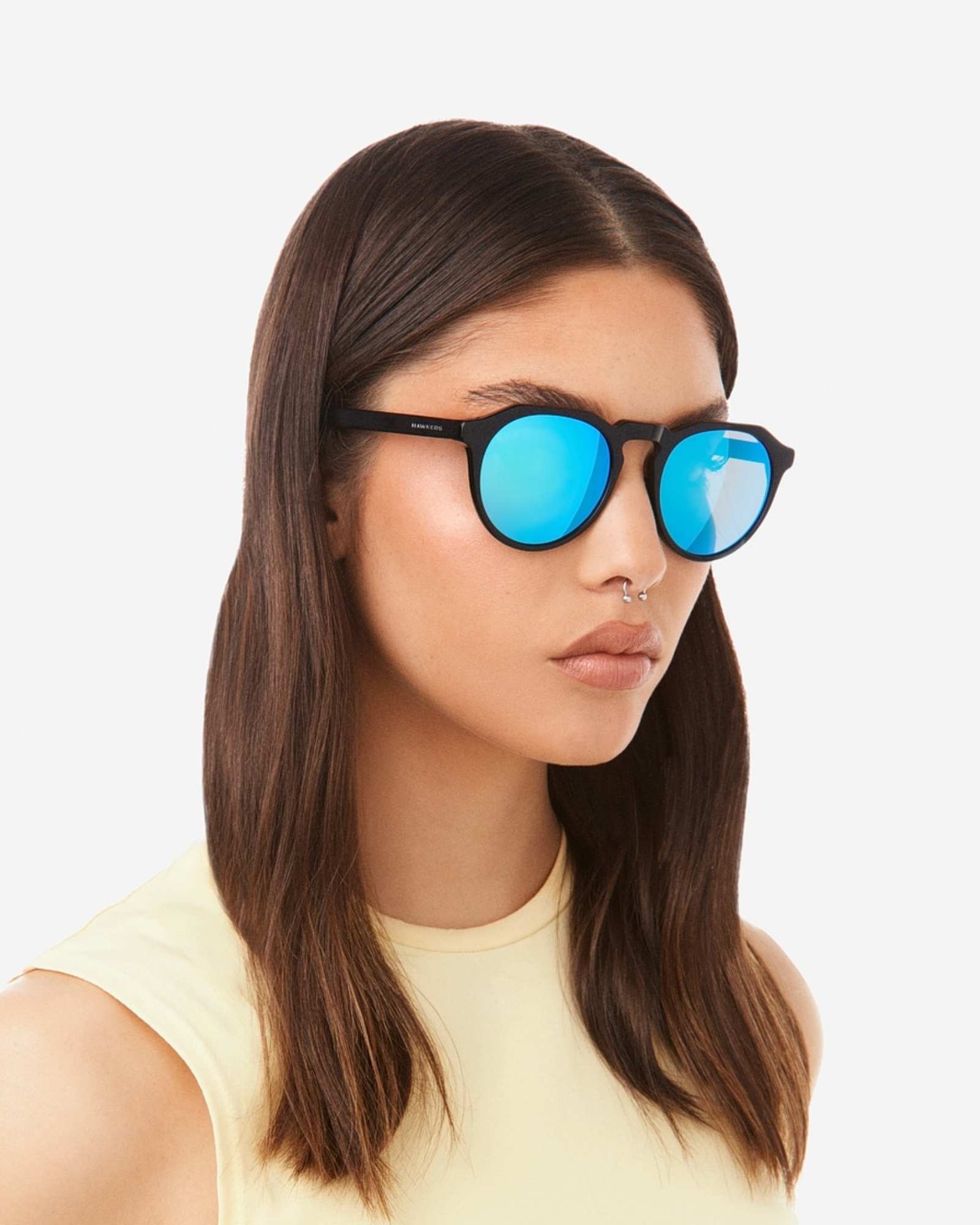 HAWKERS - Diamond Black Clear Blue WARWICK X Sunglasses for Men and Women UV400