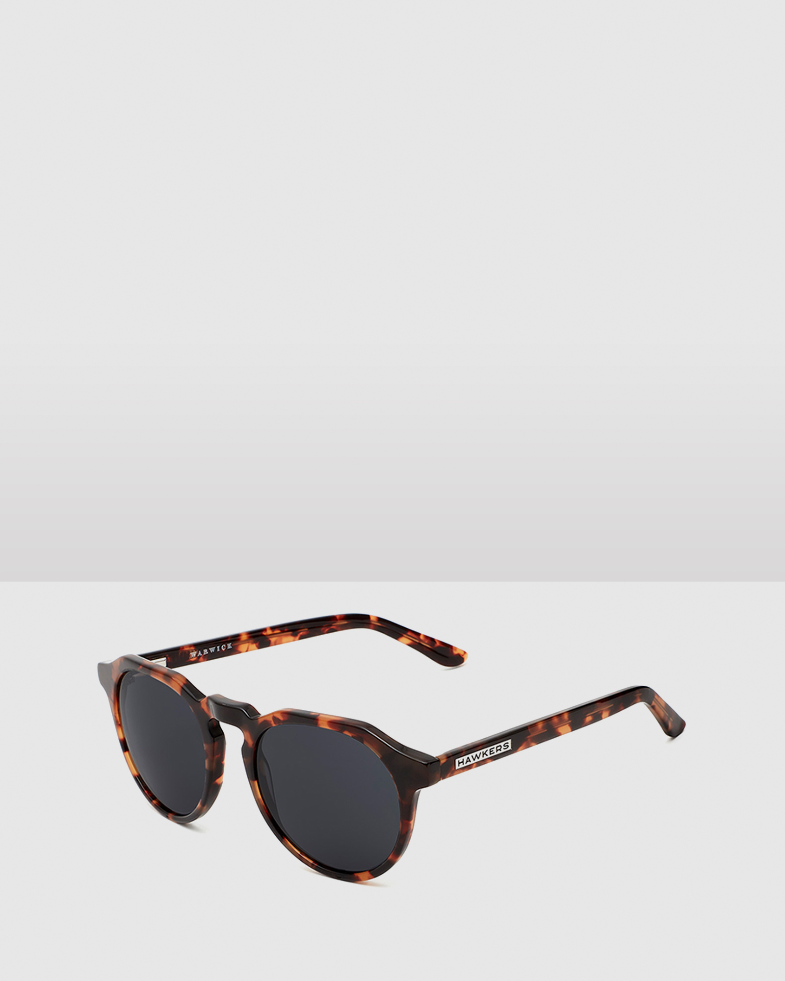 HAWKERS - Carey Black Lens WARWICK X Sunglasses for Men and Women UV400