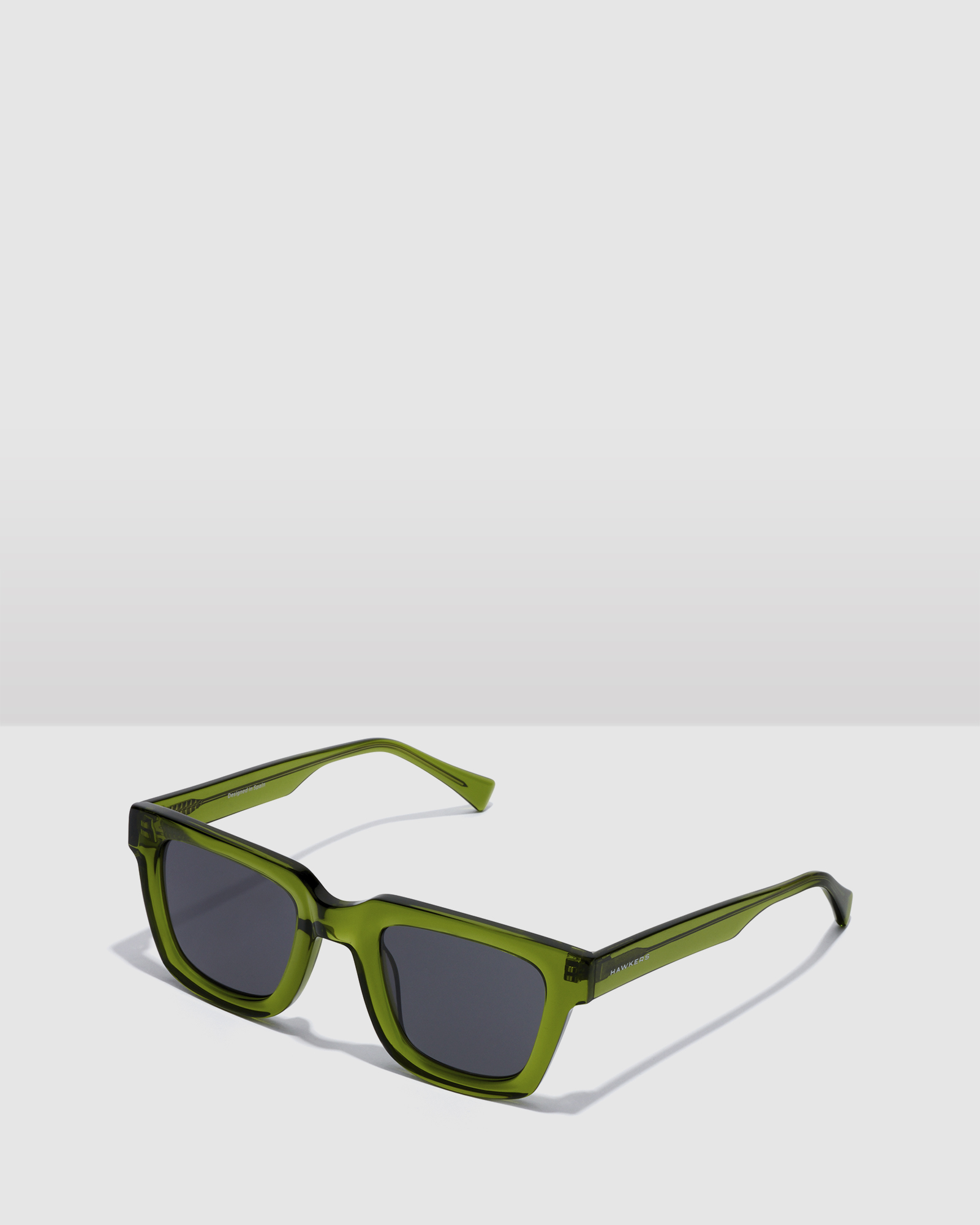 HAWKERS - Green Dark ONE UPTOWN Sunglasses for Men and Women UV400
