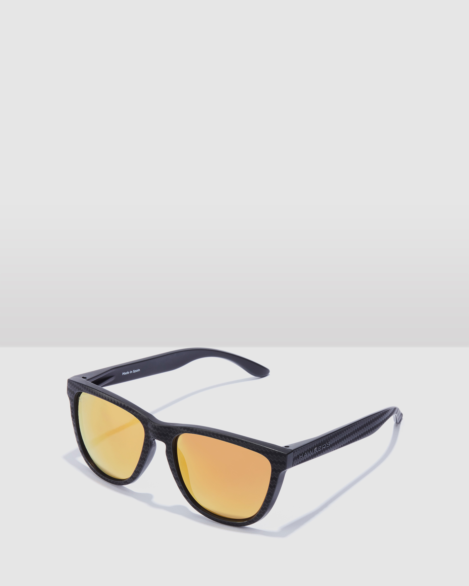 HAWKERS - Polarized Daylight ONE RAW CARBONO Sunglasses for Men and Women UV400