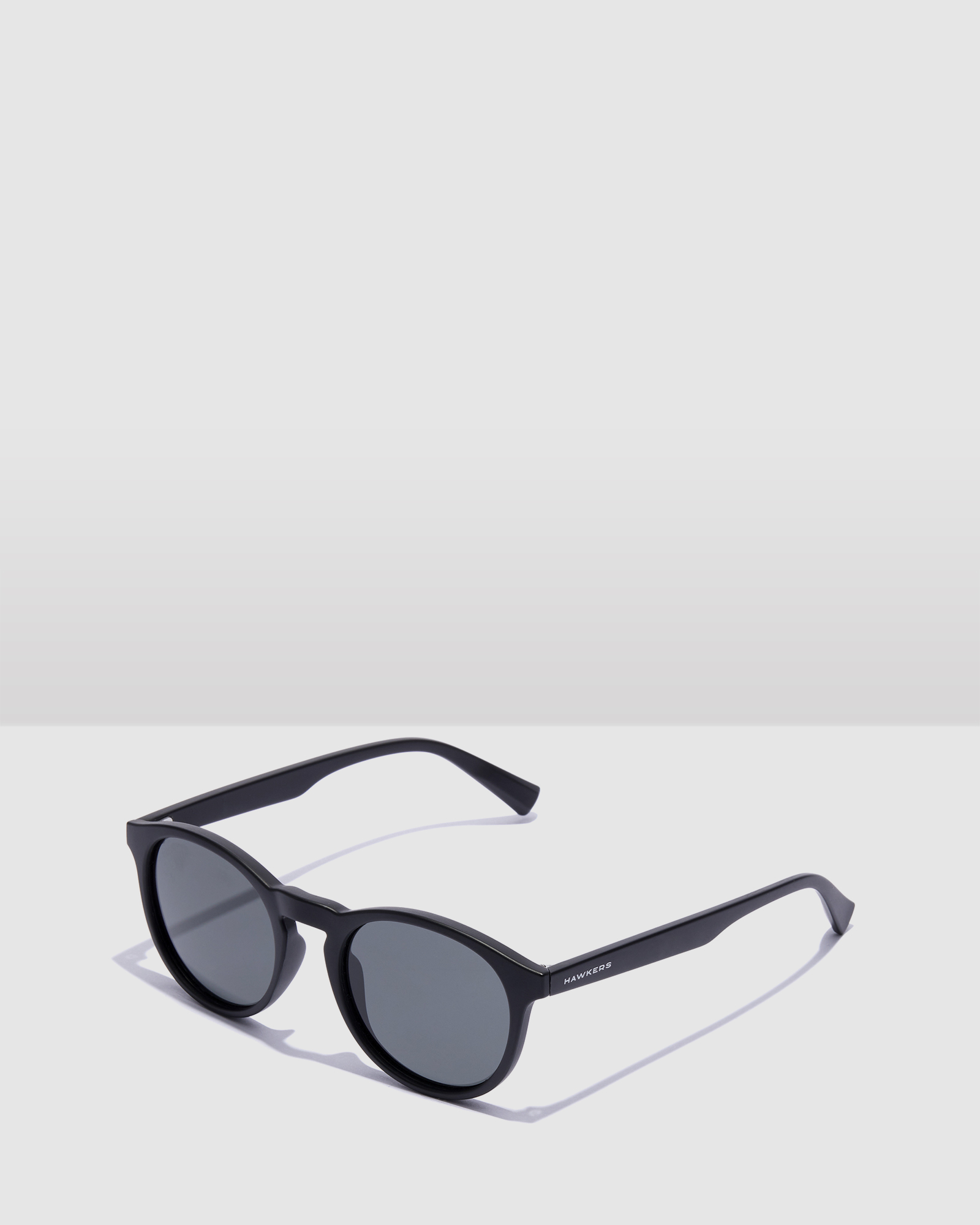 HAWKERS - Polarized Black BEL AIR Sunglasses for Men and Women UV400