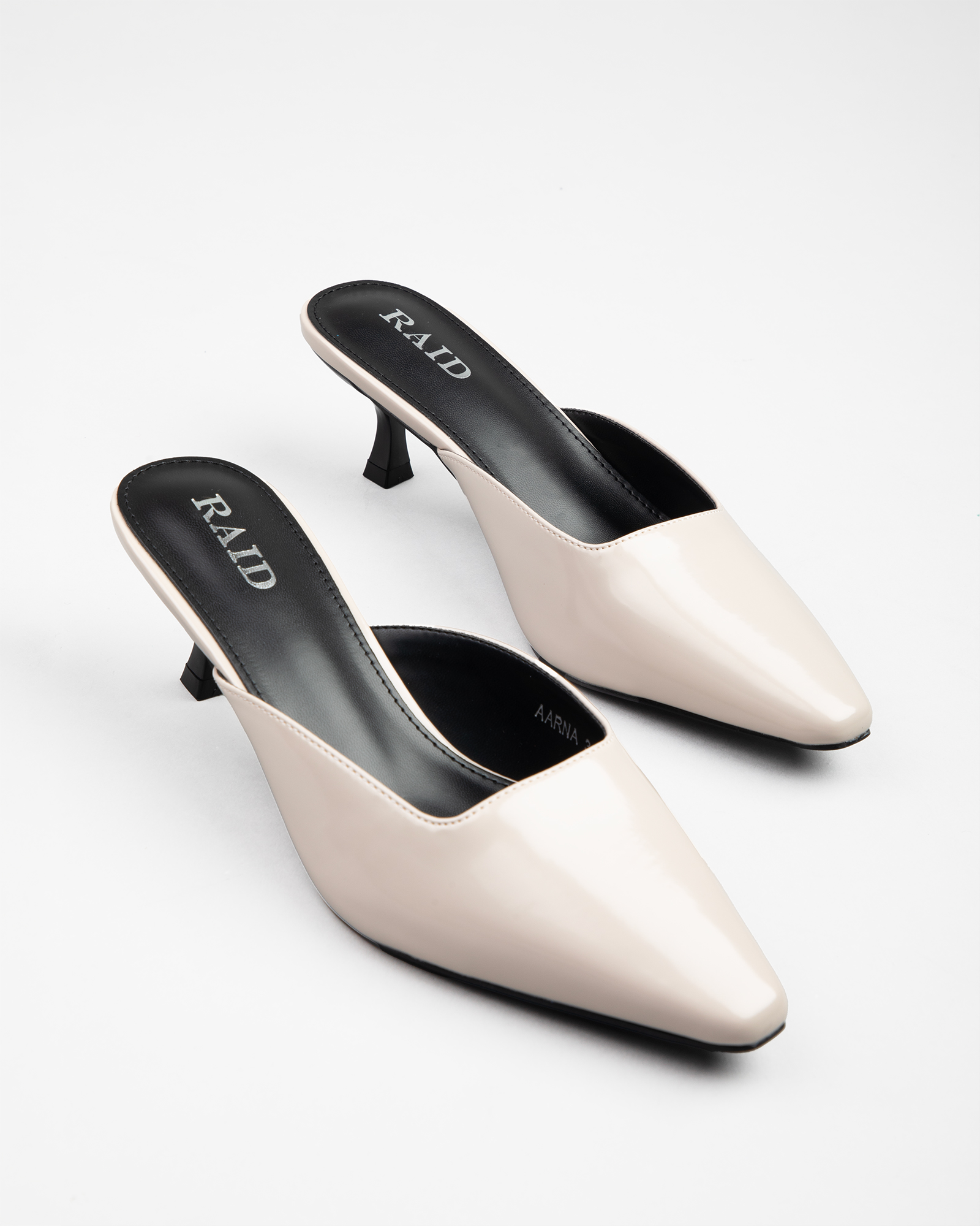 Aarna kitten heeled mules in Beige