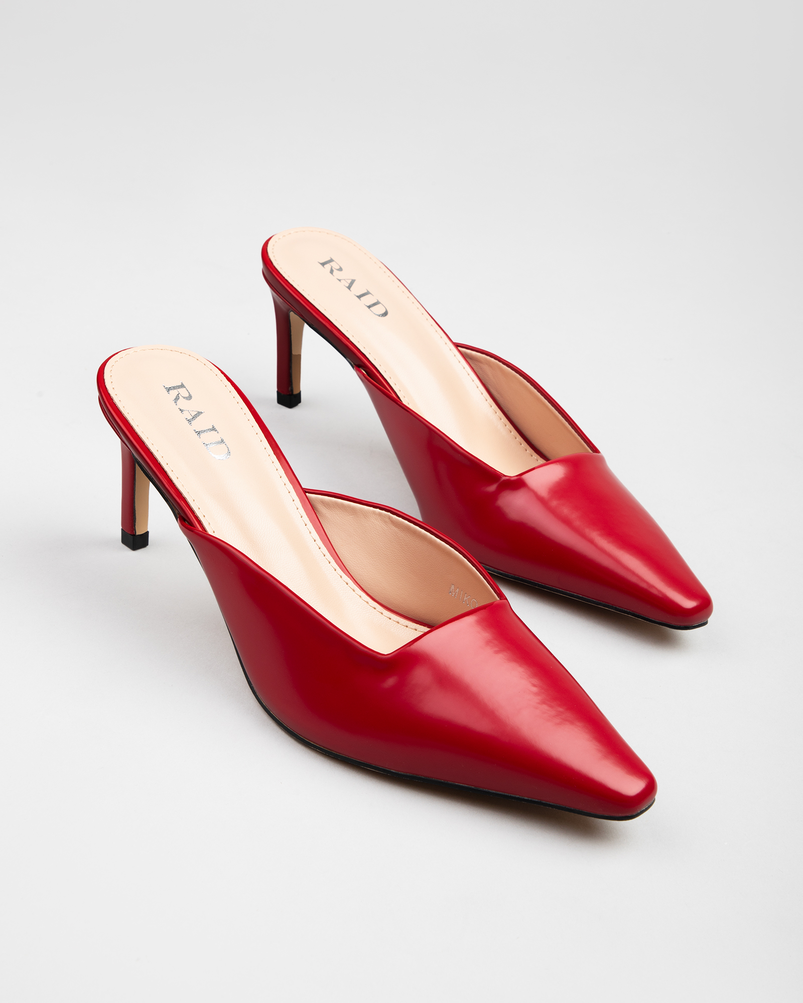 Miko kitten heeled mules in Red