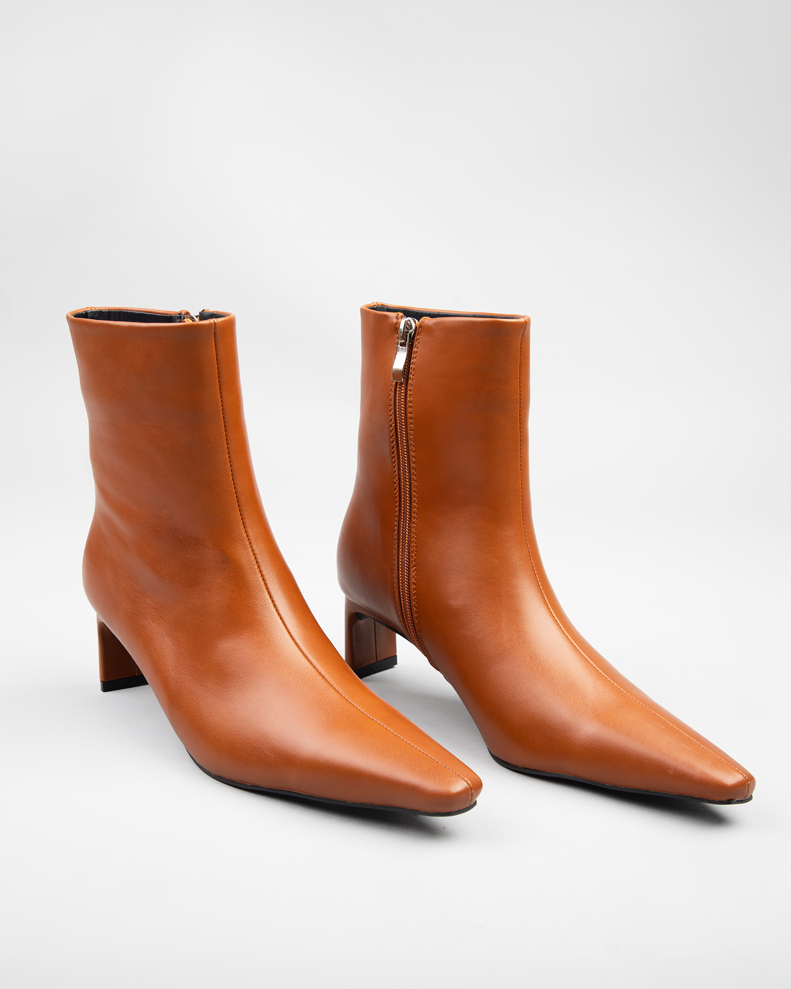 Penelope flat heeled ankle boots in tan