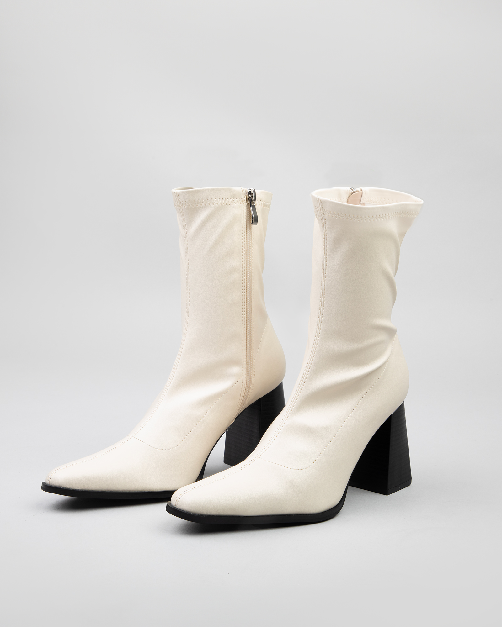 Whisper Block heeled ankle boots in cream
